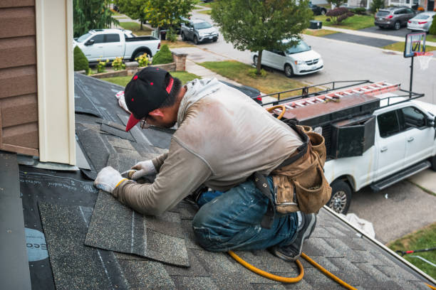 Professional Roofing technician working in Alexander, NY